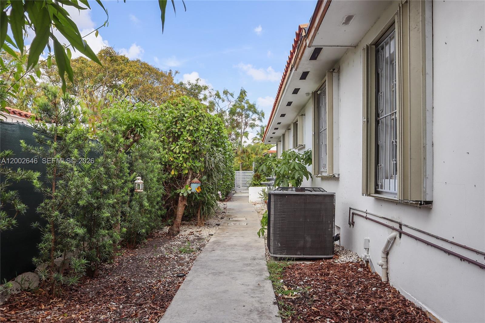 619 Southwest 39th Avenue Miami, FL 33134 - Photo 17 of 24 a view of a house with a potted plant