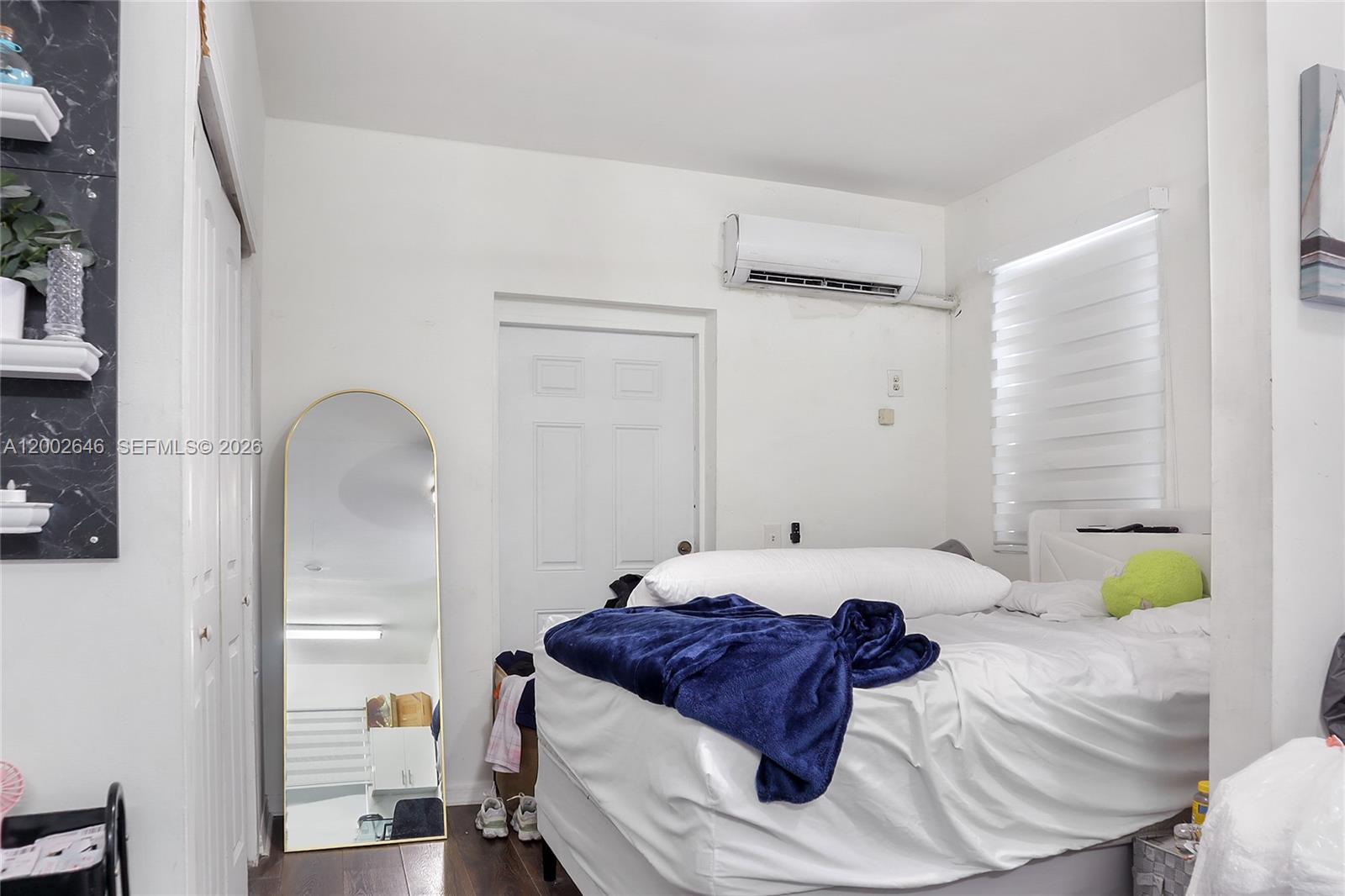 619 Southwest 39th Avenue Miami, FL 33134 - Photo 18 of 24 a bedroom with a bed and a window