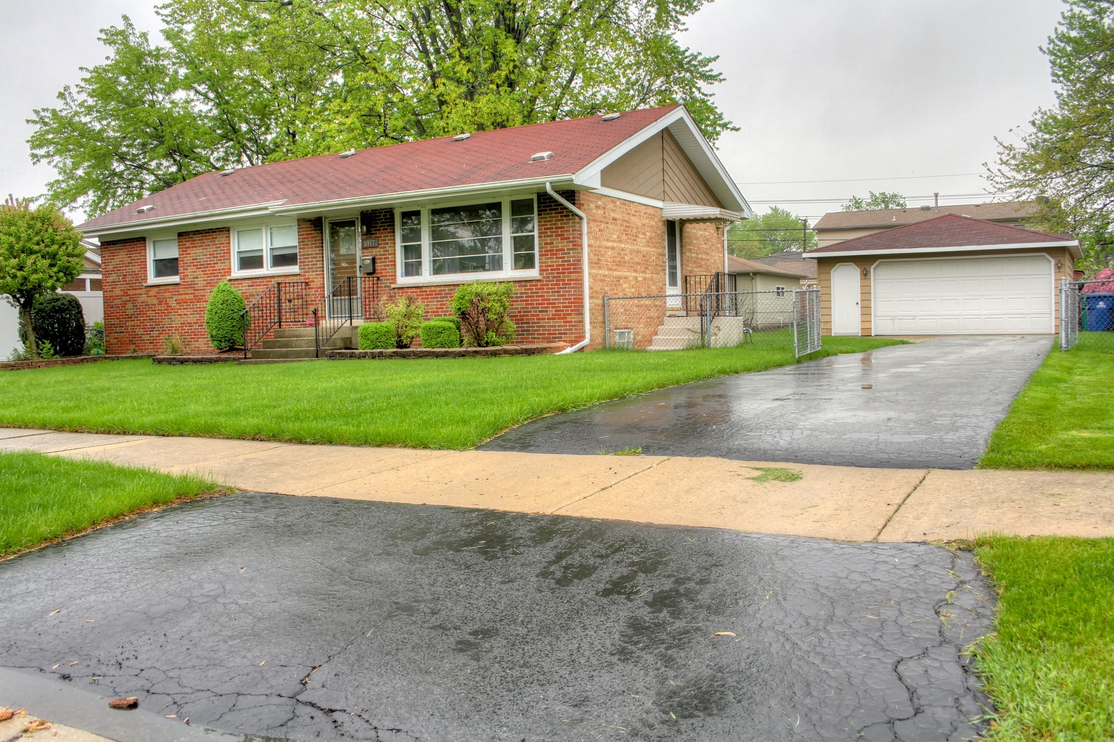 5917 108th Place Chicago Ridge, IL 60415 - Photo 2 of 34 a view of outdoor space yard and front view of a house