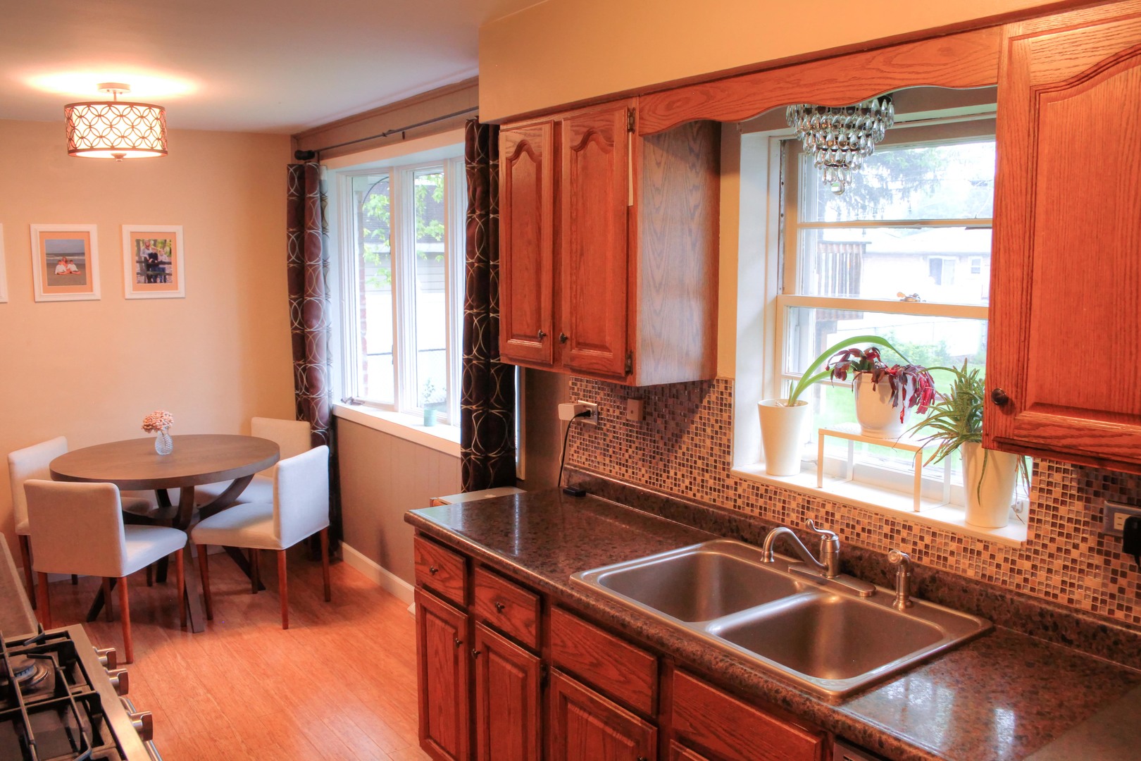 5917 108th Place Chicago Ridge, IL 60415 - Photo 12 of 34 a bathroom with a sink and a window