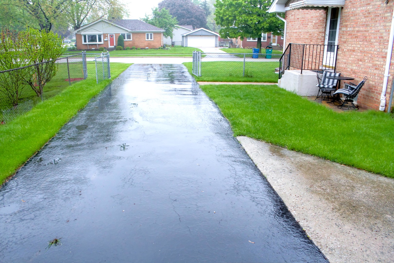 5917 108th Place Chicago Ridge, IL 60415 - Photo 33 of 34 a view of a street with a house in the background