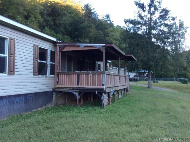 70 Minor Road Marble, NC 28905 - Photo 1 of 9 a view of a wooden deck and a backyard