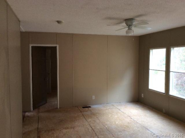 70 Minor Road Marble, NC 28905 - Photo 3 of 9 an empty room with a window