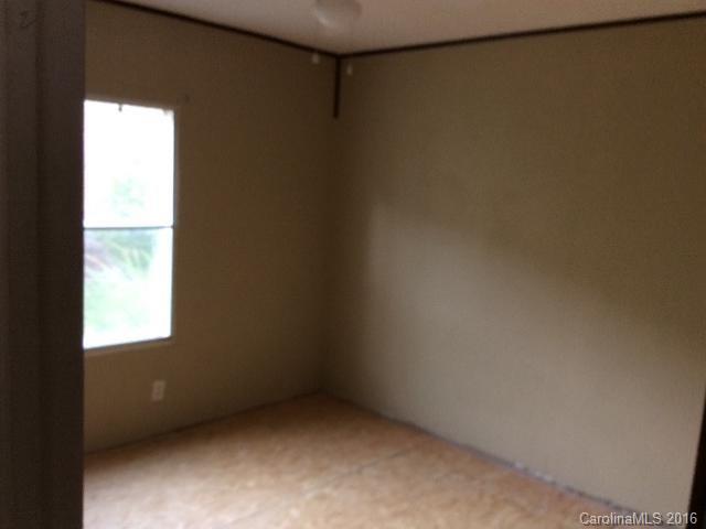 70 Minor Road Marble, NC 28905 - Photo 6 of 9 a view of an empty room with a window