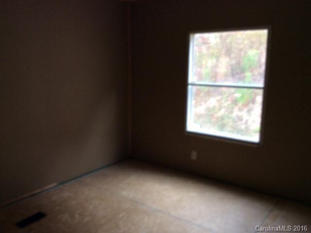 70 Minor Road Marble, NC 28905 - Photo 7 of 9 a view of an empty room with a window