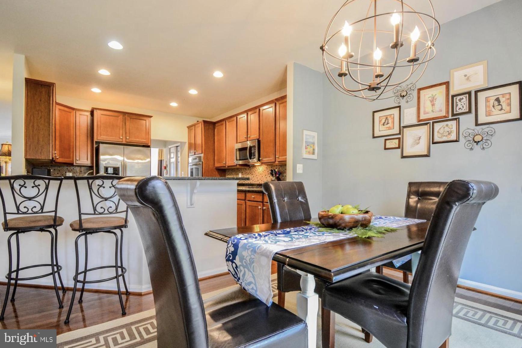 3321 Eagle Ridge Drive Woodbridge, VA 22191 - Photo 14 of 30 Charming dining area with modern flair.