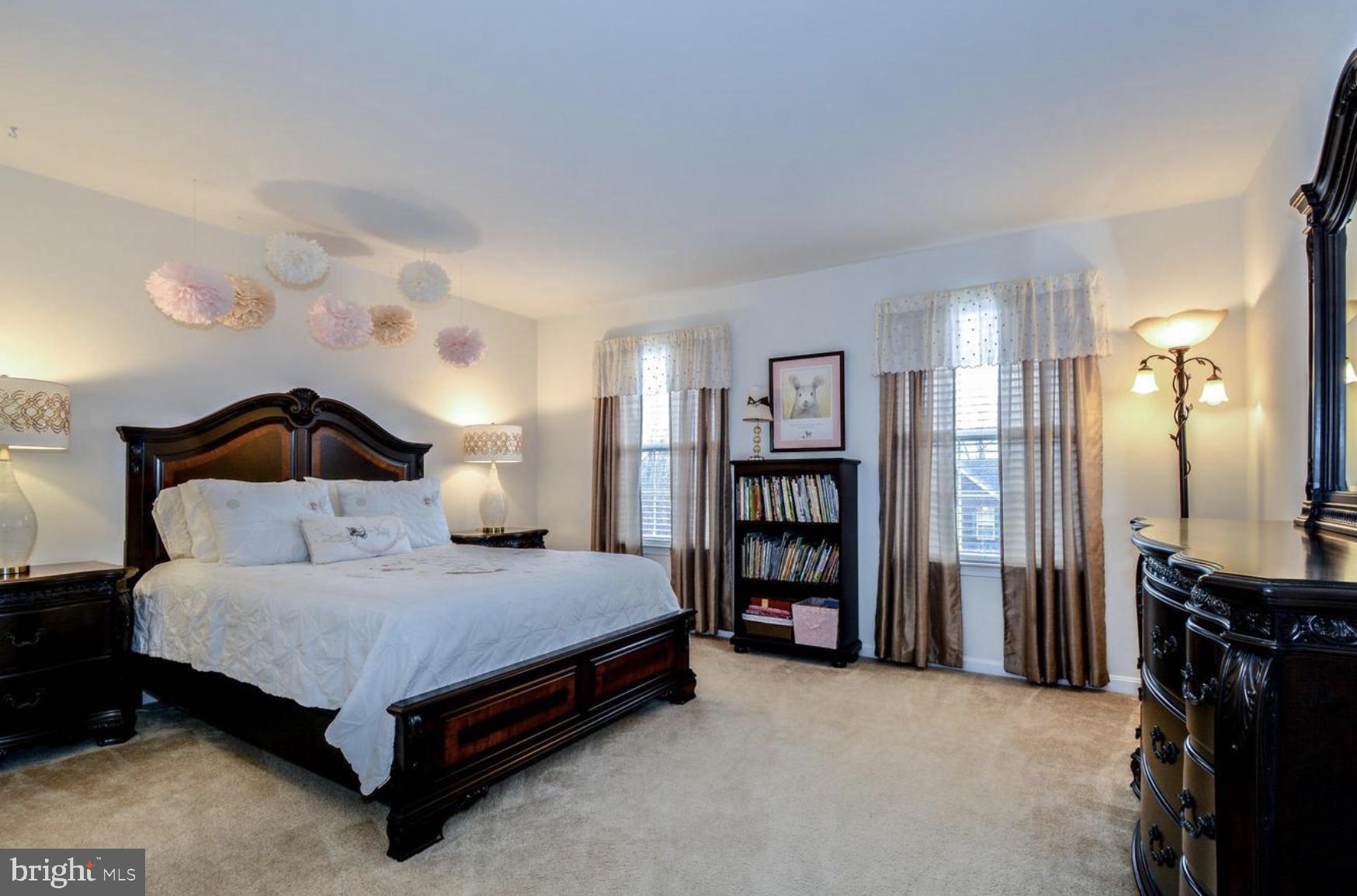 3321 Eagle Ridge Drive Woodbridge, VA 22191 - Photo 22 of 30 Serene bedroom with elegant decor.