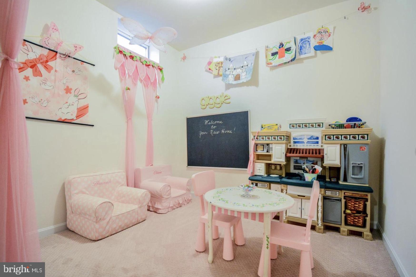 3321 Eagle Ridge Drive Woodbridge, VA 22191 - Photo 27 of 30 Charming playroom in soft pink hues.