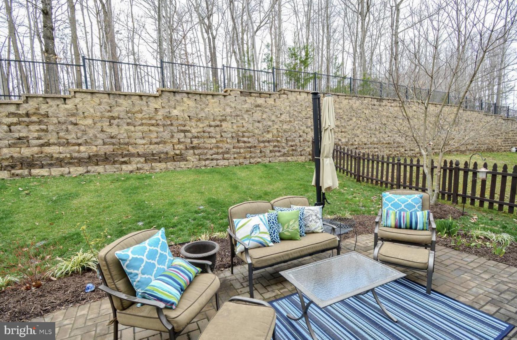 3321 Eagle Ridge Drive Woodbridge, VA 22191 - Photo 30 of 30 Serene backyard retreat with stone wall.