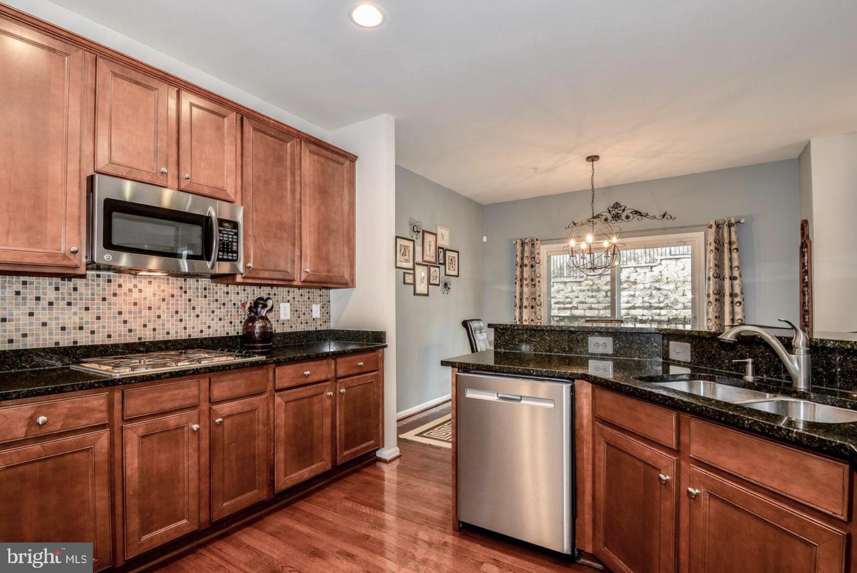 3321 Eagle Ridge Drive Woodbridge, VA 22191 - Photo 8 of 30 Modern kitchen with rich wood accents.