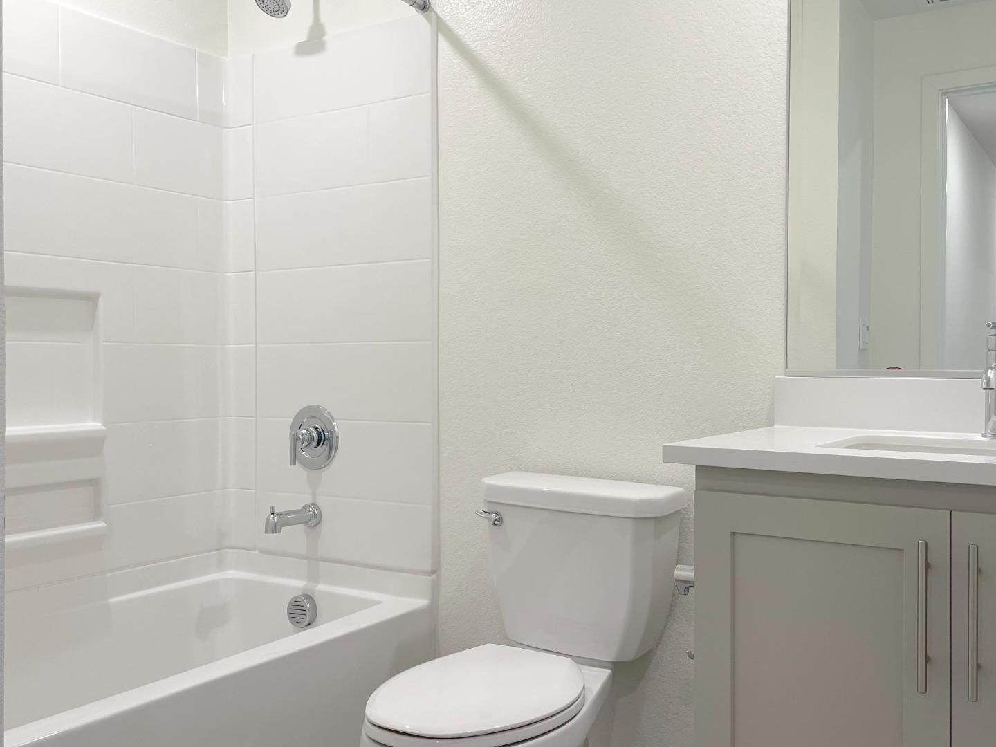 9600 Seawind Way Newark, CA 94560 - Photo 20 of 24 a bathroom with a sink toilet and bathtub