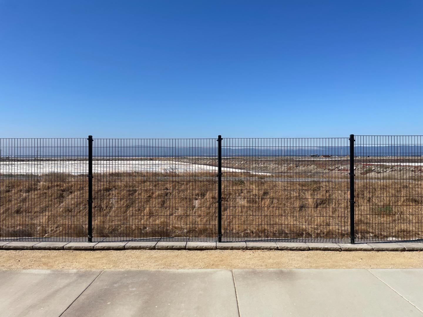 9600 Seawind Way Newark, CA 94560 - Photo 24 of 24 a view of a swimming pool with a yard