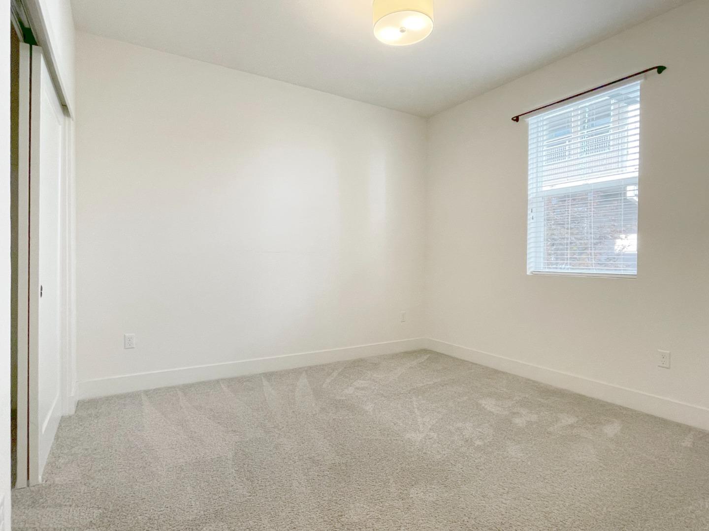 9600 Seawind Way Newark, CA 94560 - Photo 4 of 24 an empty room with a window