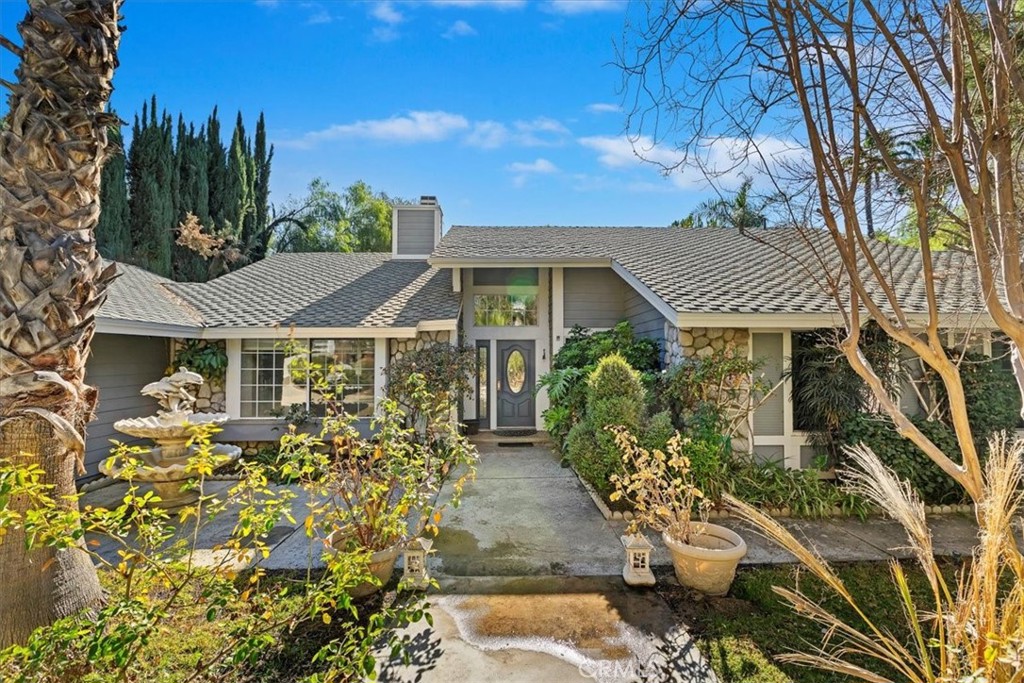 16925 Owl Tree Road Riverside, CA 92504 - Photo 1 of 1 a front view of a house with garden