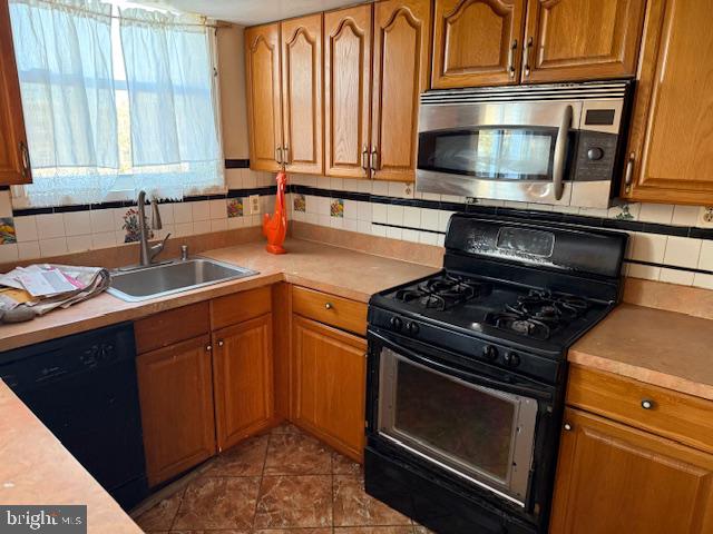 337 Copley Road Upper Darby, PA 19082 - Photo 5 of 13 Cozy kitchen with warm wood tones.
