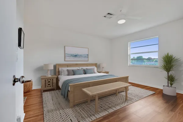 a view of a livingroom with wooden floor