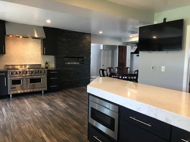 a view of an entryway with wooden floor
