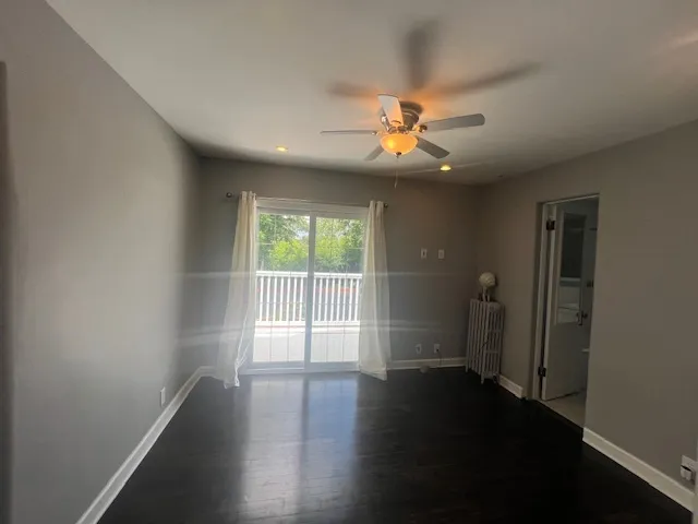 a front view of a house with a yard and porch