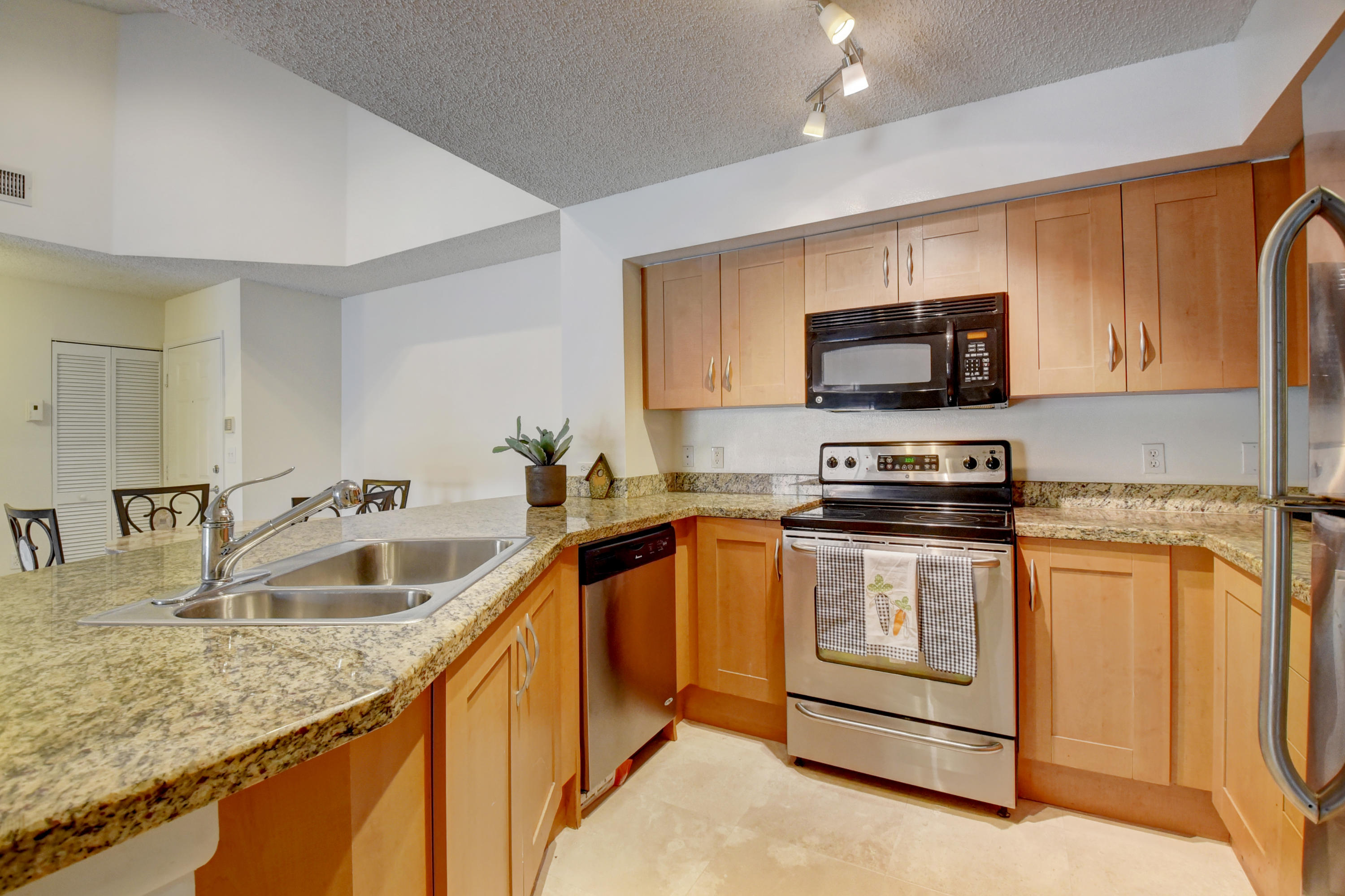 3133 Clint Moore Road, Unit 205 Boca Raton, FL 33496 - Photo 3 of 28 GRANITE COUNTERS