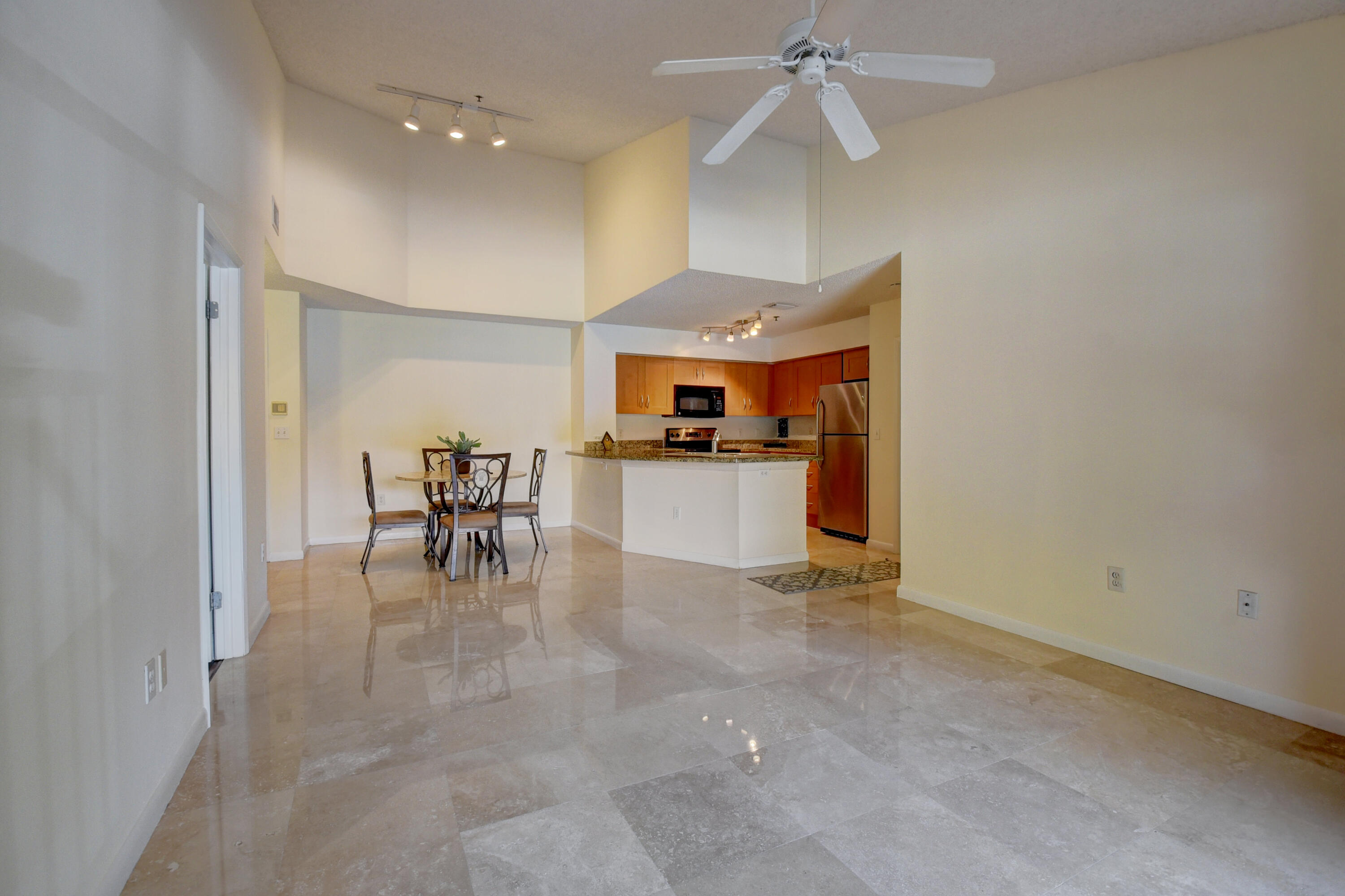 3133 Clint Moore Road, Unit 205 Boca Raton, FL 33496 - Photo 8 of 28 LARGE LIVING ROOM WITH FIRE PLACE