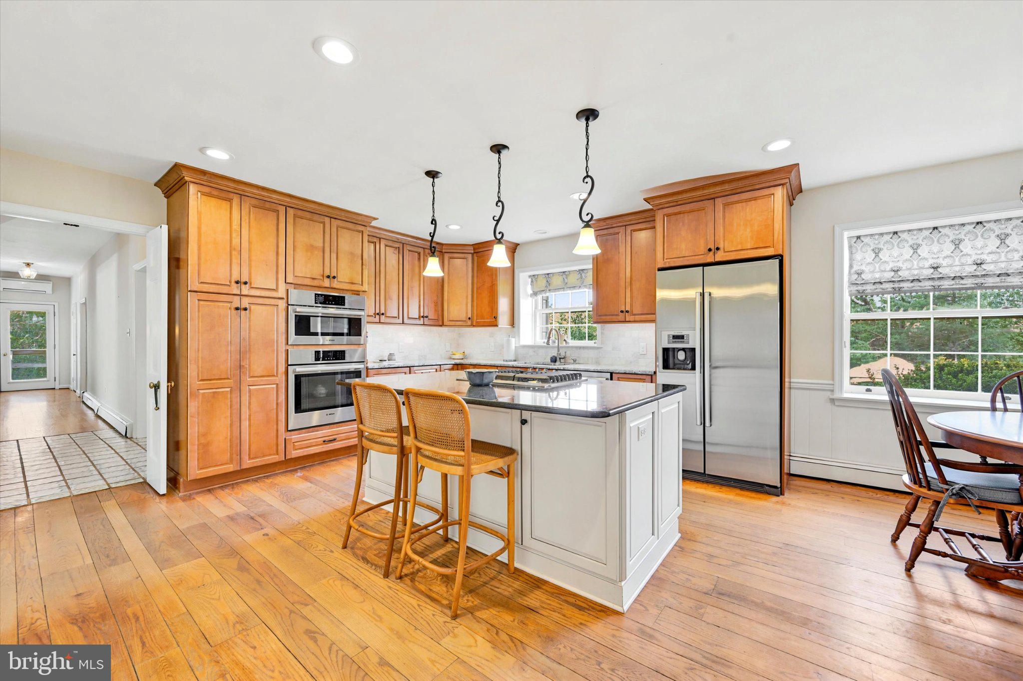 1646 Fairview Road Glenmoore, PA 19343 - Photo 7 of 29 Modern kitchen with warm wood accents.