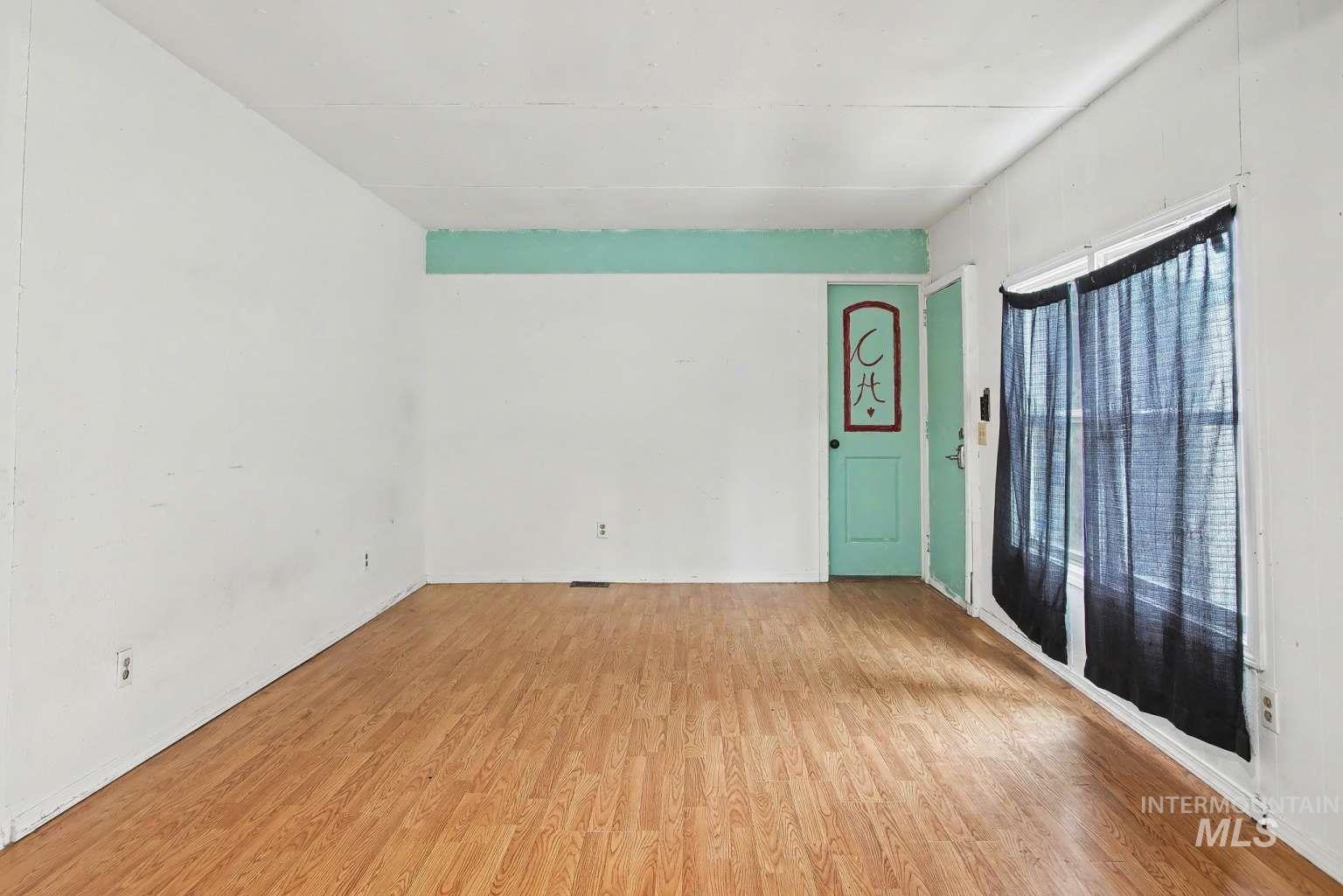 628 Burrell Avenue, Unit 5 Lewiston, ID 83501 - Photo 5 of 15 Spare room with light wood finished floors
