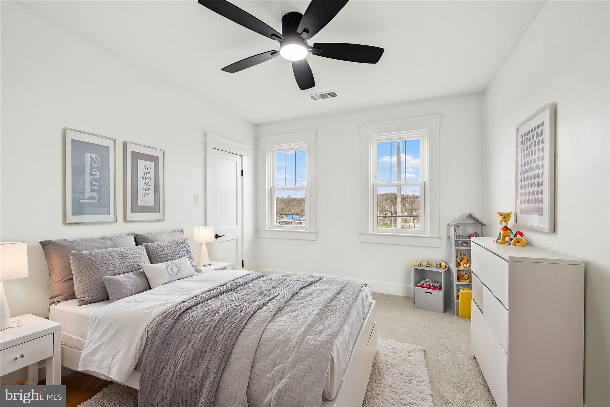 1127 Chesaco Avenue Rosedale, MD 21237 - Photo 21 of 38 a bedroom with a bed and a window
