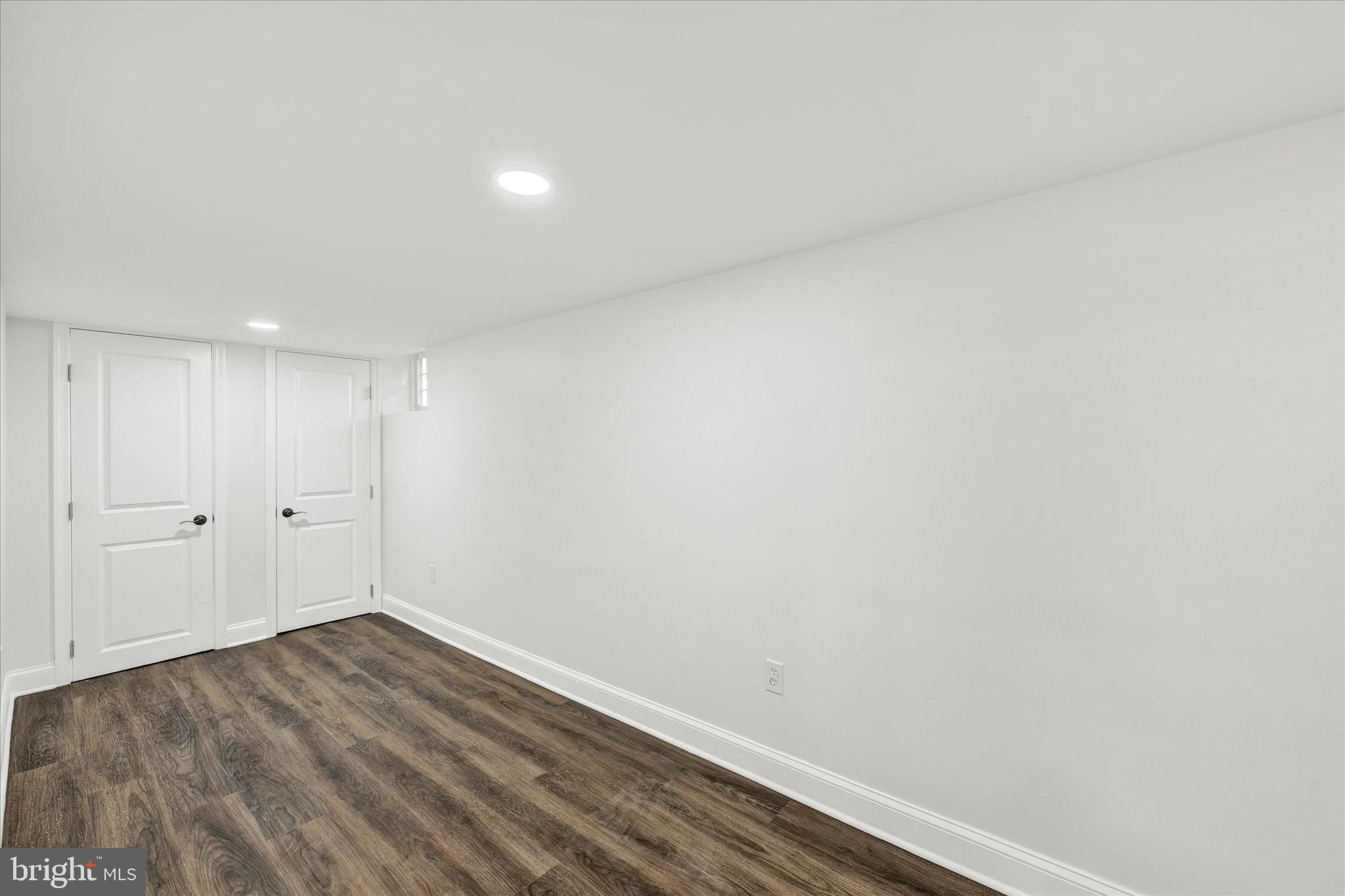1127 Chesaco Avenue Rosedale, MD 21237 - Photo 29 of 38 a view of room with wooden floor