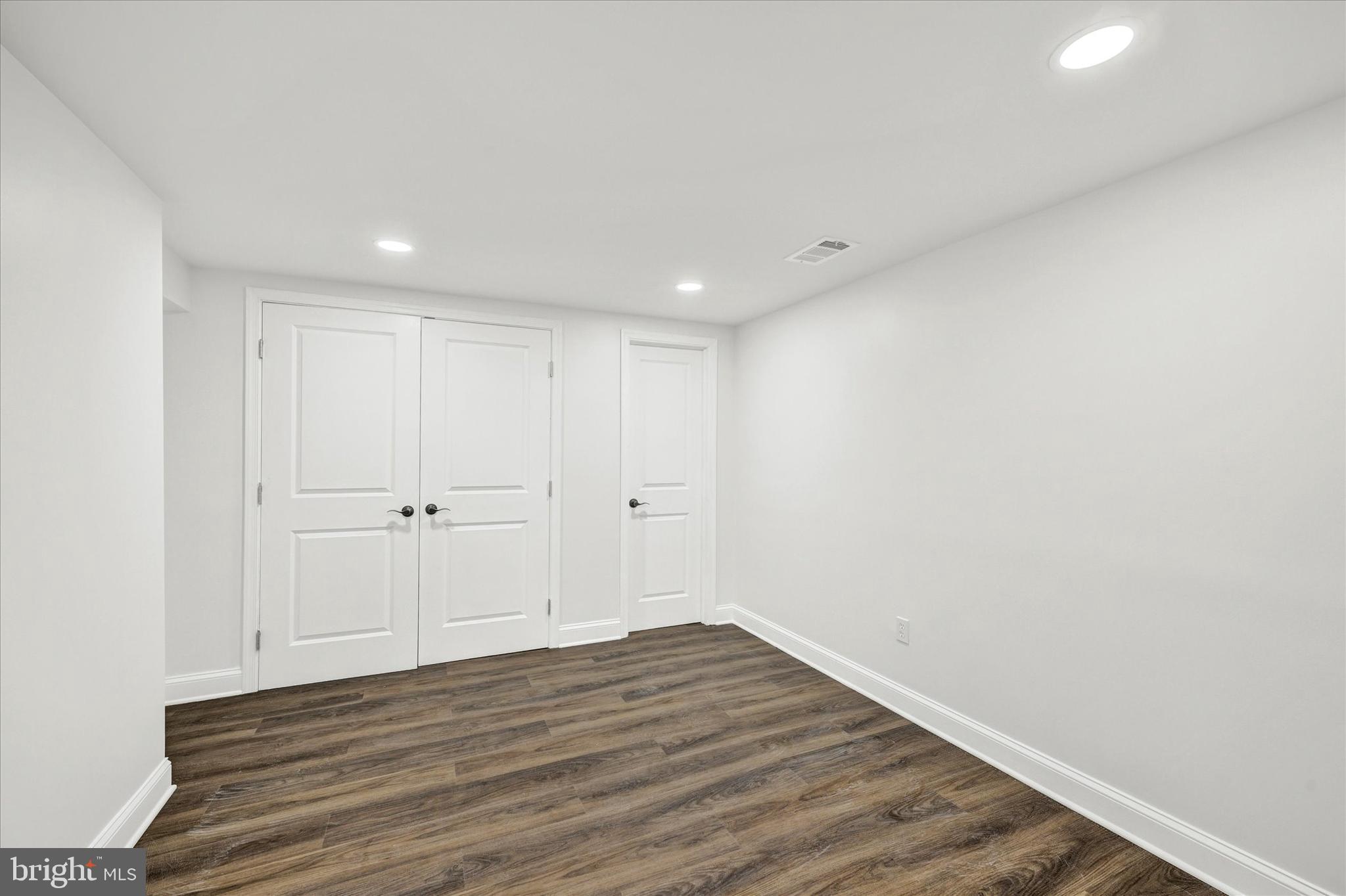 1127 Chesaco Avenue Rosedale, MD 21237 - Photo 30 of 38 a view of room with wooden floor