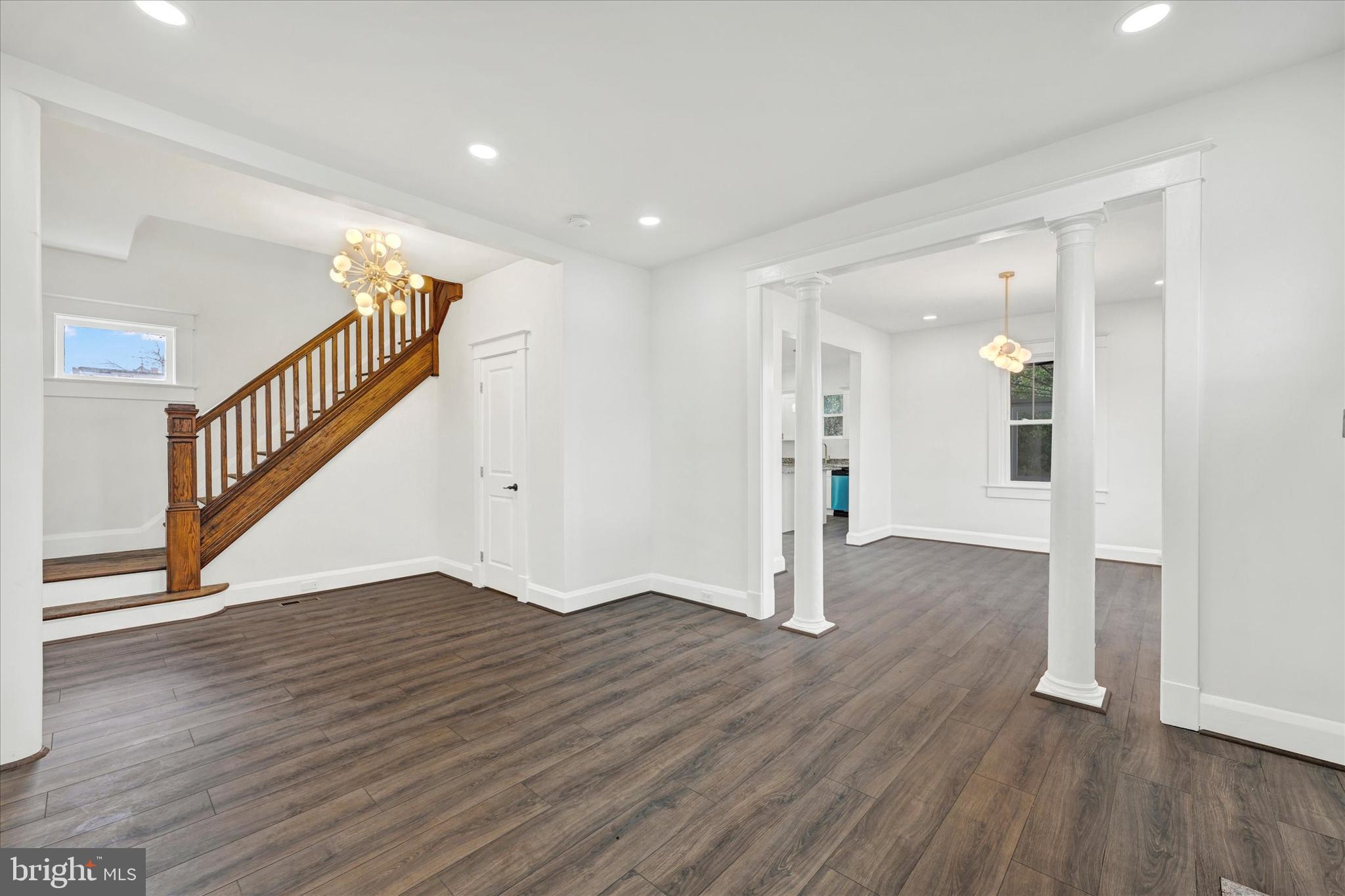 1127 Chesaco Avenue Rosedale, MD 21237 - Photo 3 of 38 a view of empty room with wooden floor