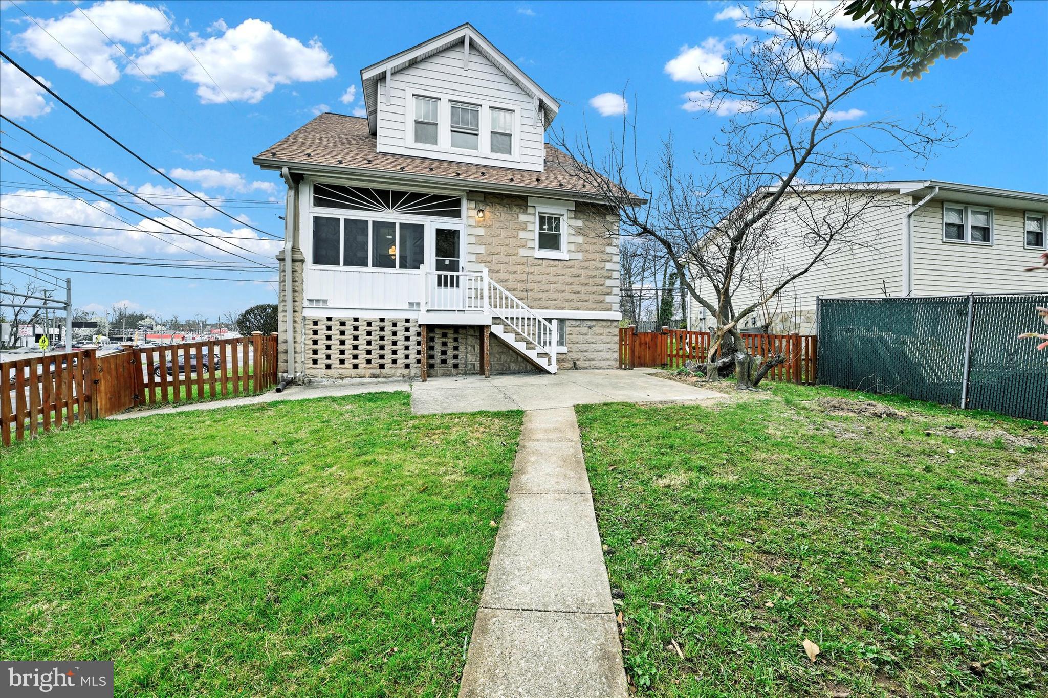 1127 Chesaco Avenue Rosedale, MD 21237 - Photo 35 of 38 a front view of a house with garden