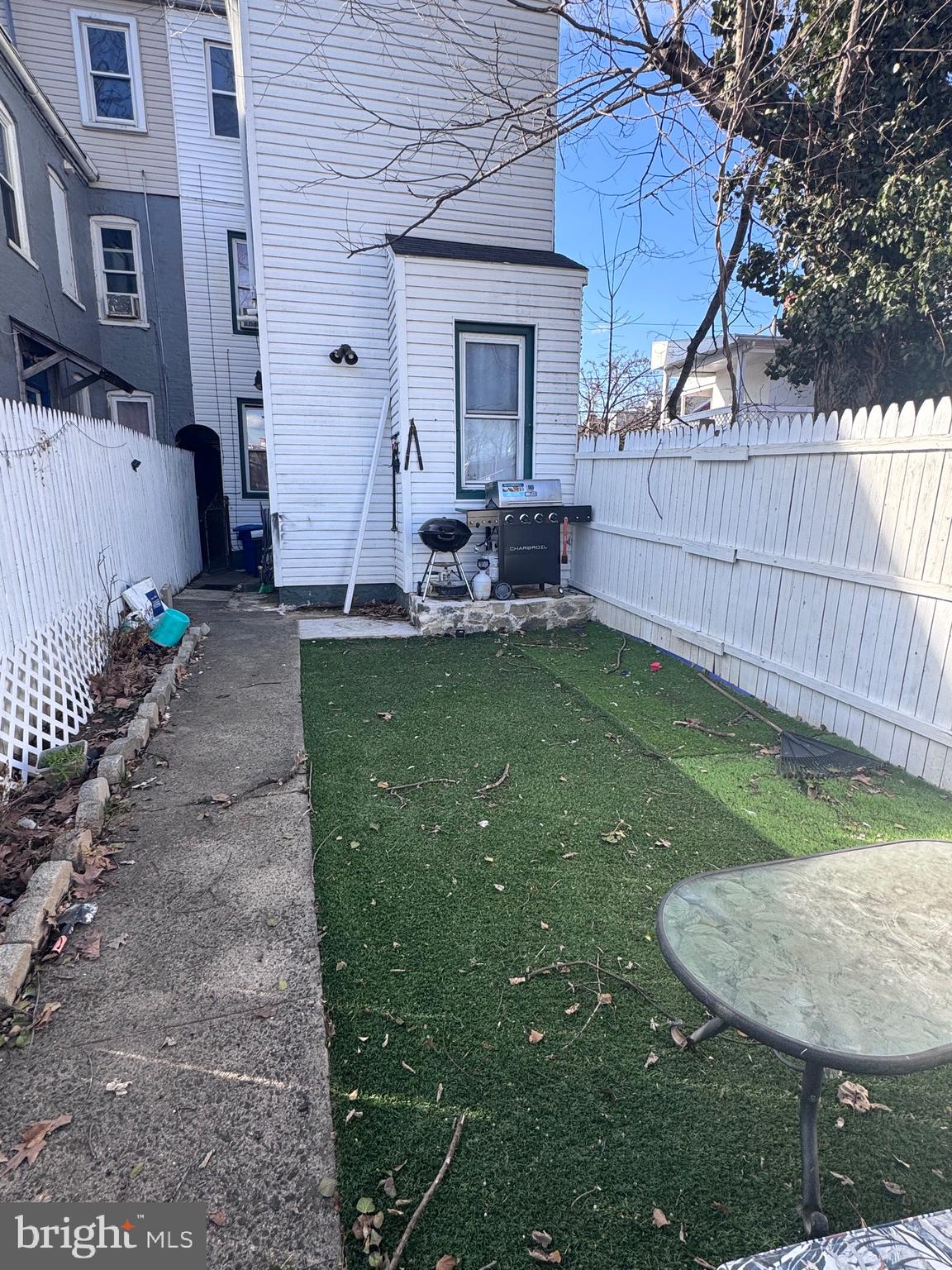 213 Juniata Street Lancaster, PA 17602 - Photo 14 of 16 a view of a house with backyard and sitting area