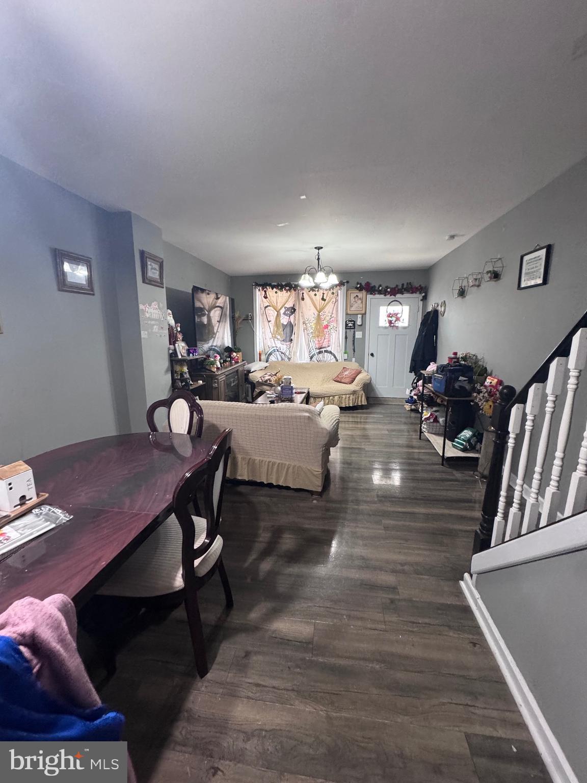 213 Juniata Street Lancaster, PA 17602 - Photo 3 of 16 a living room with furniture a rug and a table