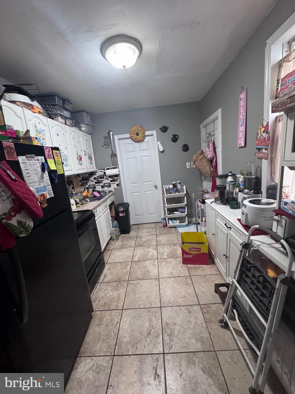 213 Juniata Street Lancaster, PA 17602 - Photo 4 of 16 a room with storage and utility