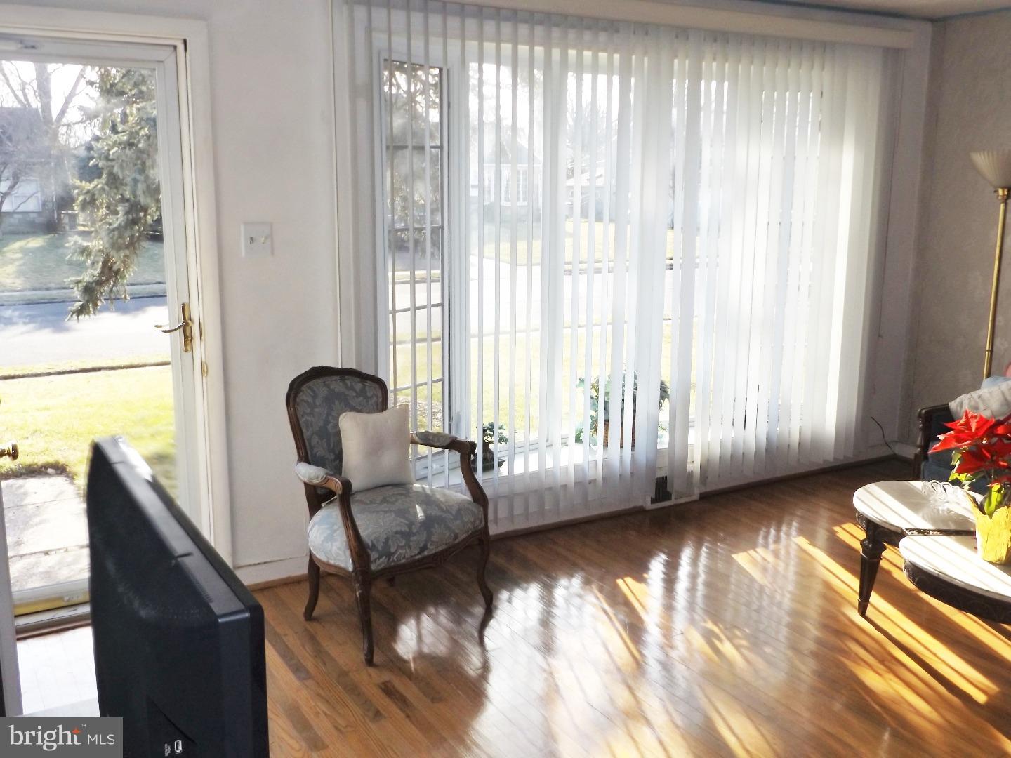 971 Victoria Road Warminster, PA 18974 - Photo 4 of 15 a living room with furniture and a large window