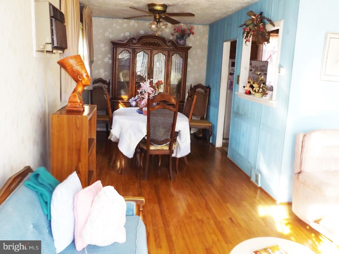 971 Victoria Road Warminster, PA 18974 - Photo 5 of 15 a living room with furniture and a chandelier
