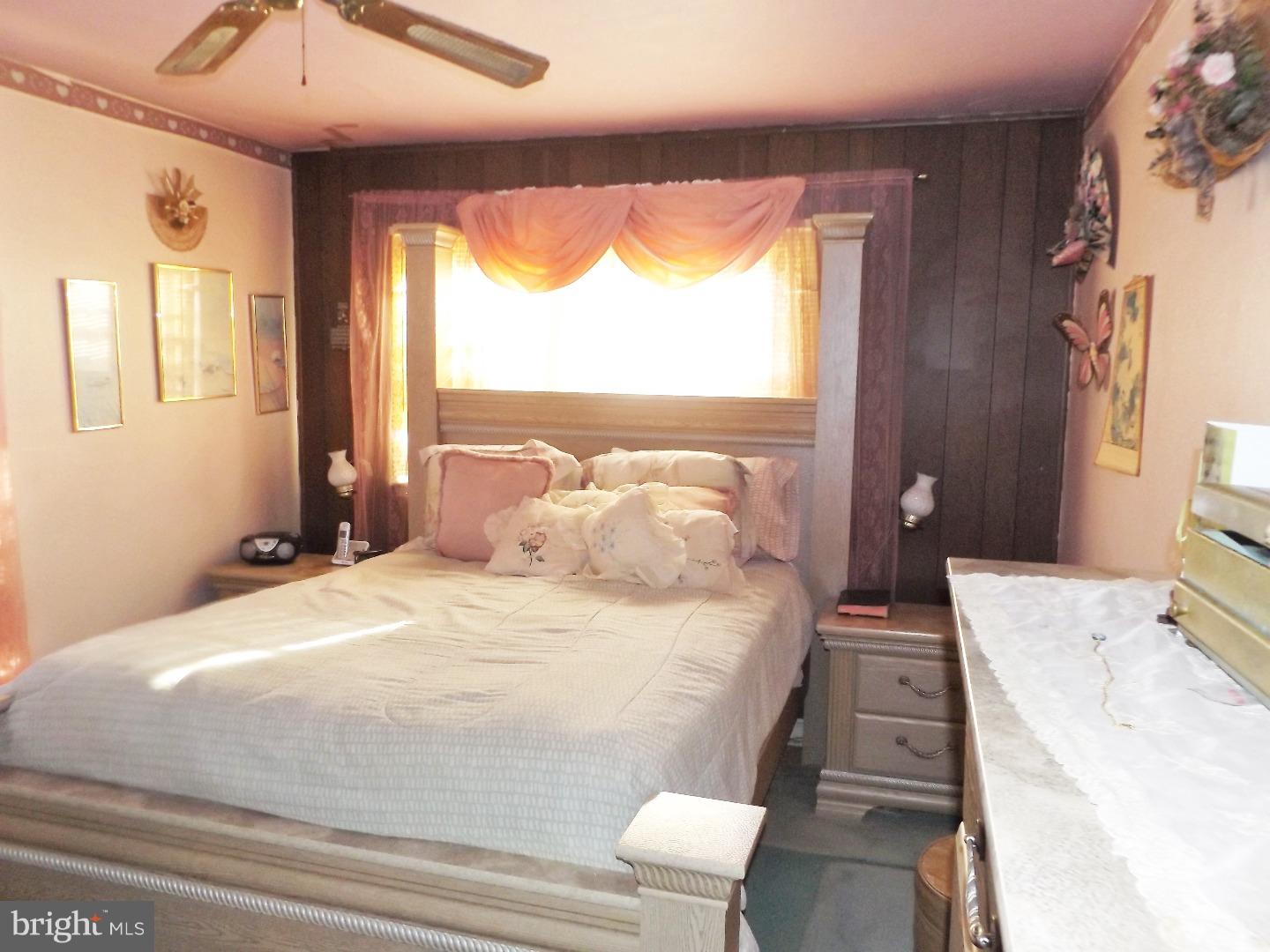 971 Victoria Road Warminster, PA 18974 - Photo 10 of 15 a bedroom with a bed and a large window