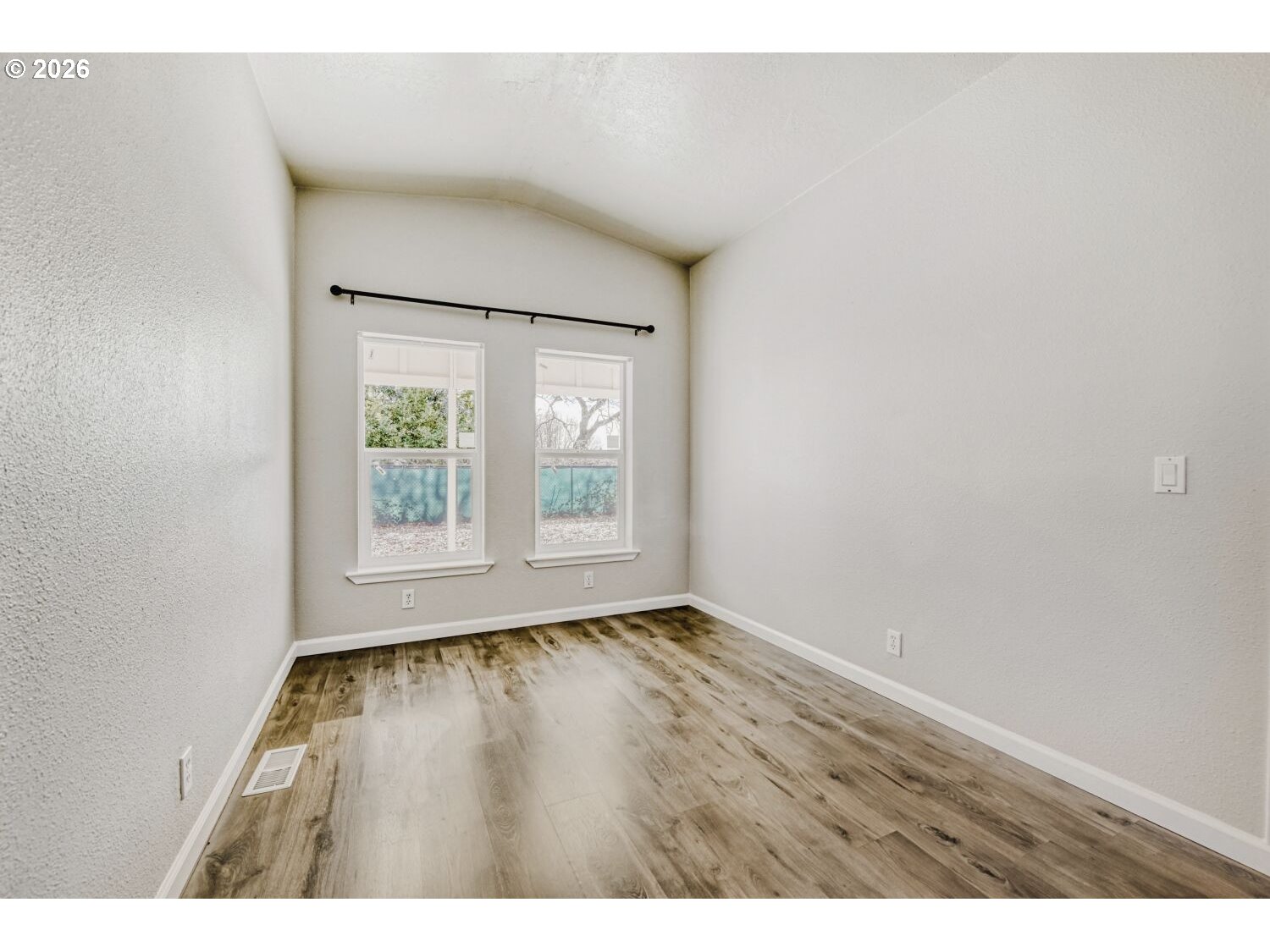 2431 North Fremont Street Cornelius, OR 97113 - Photo 11 of 29 a view of an empty room with a window