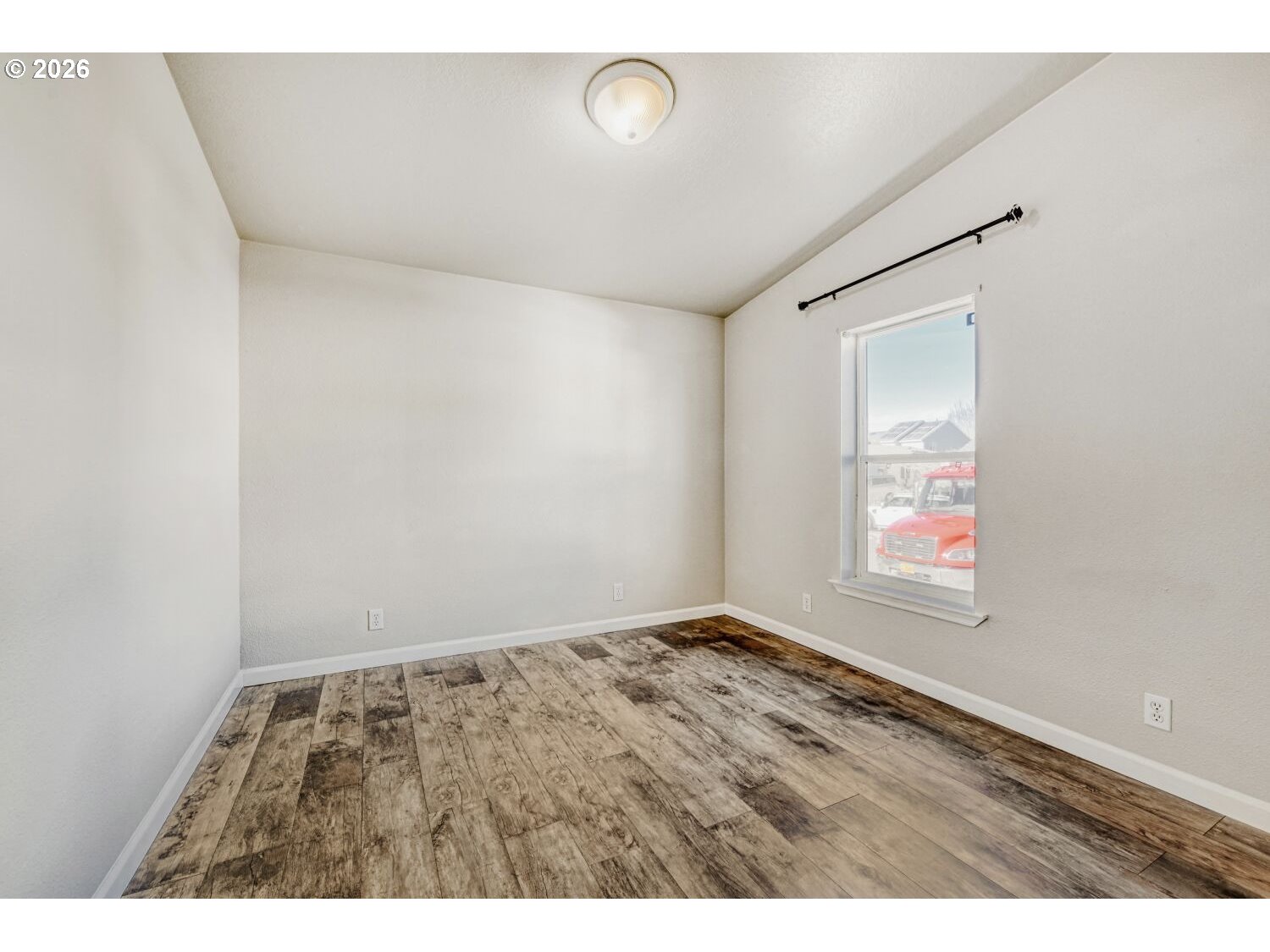 2431 North Fremont Street Cornelius, OR 97113 - Photo 12 of 29 a view of an empty room with a window