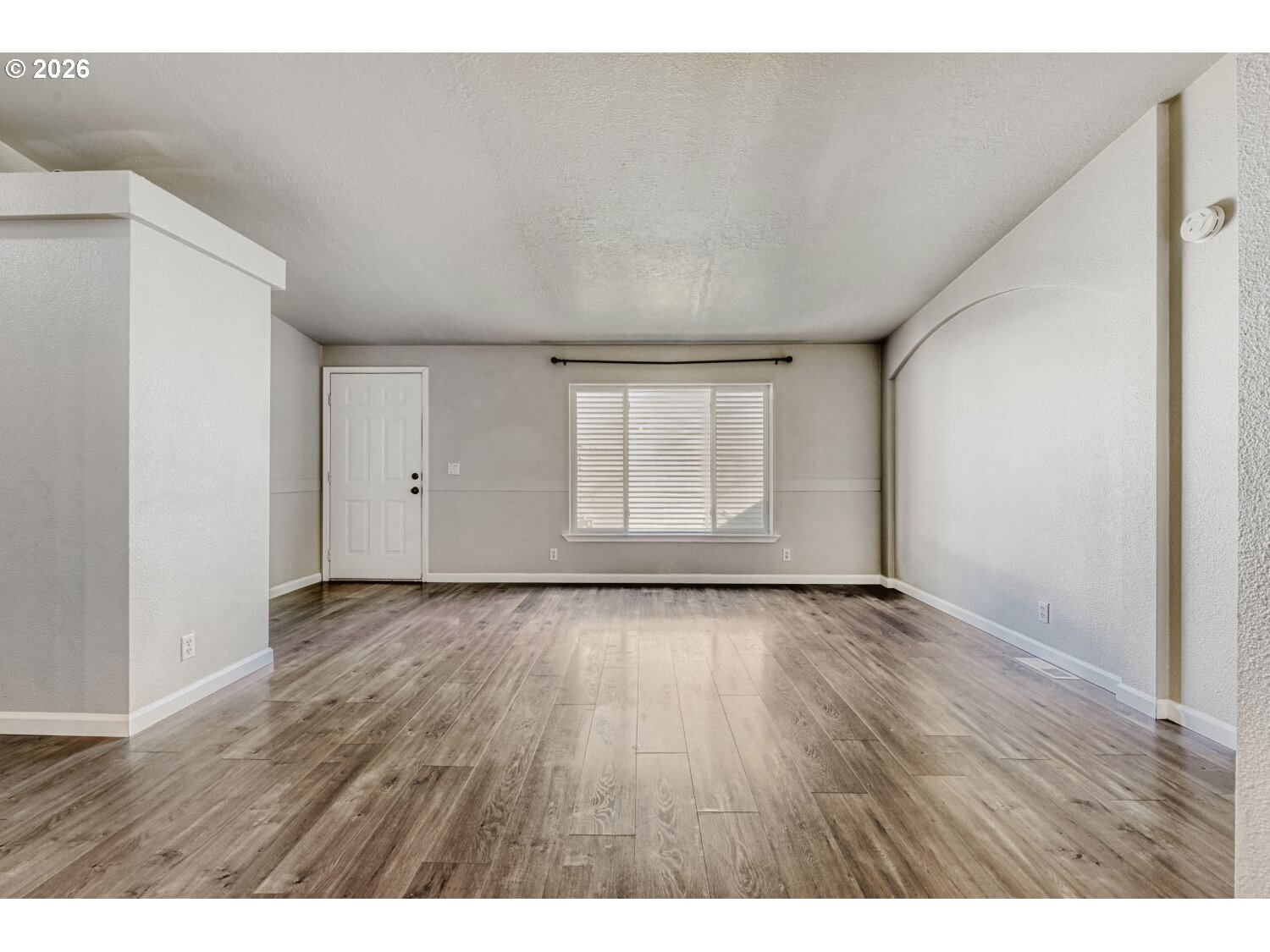 2431 North Fremont Street Cornelius, OR 97113 - Photo 15 of 29 a view of an empty room and wooden floor