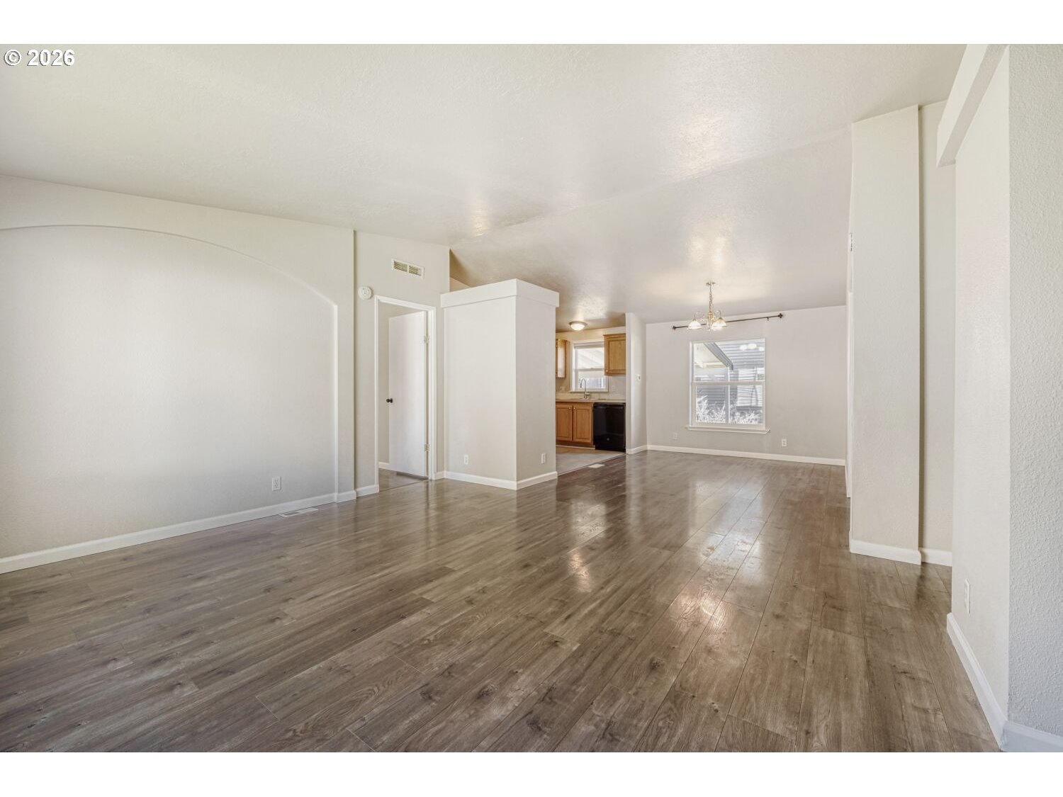 2431 North Fremont Street Cornelius, OR 97113 - Photo 16 of 29 a view of empty room with wooden floor