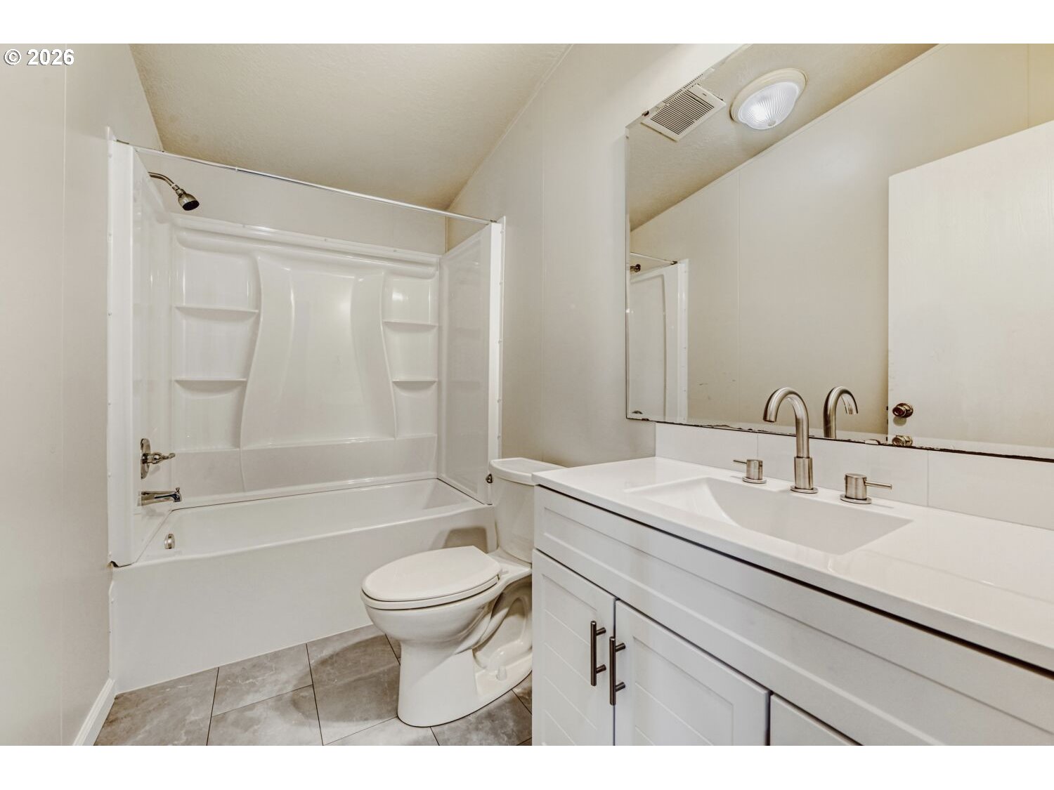 2431 North Fremont Street Cornelius, OR 97113 - Photo 22 of 29 a bathroom with a sink a toilet and a bathtub