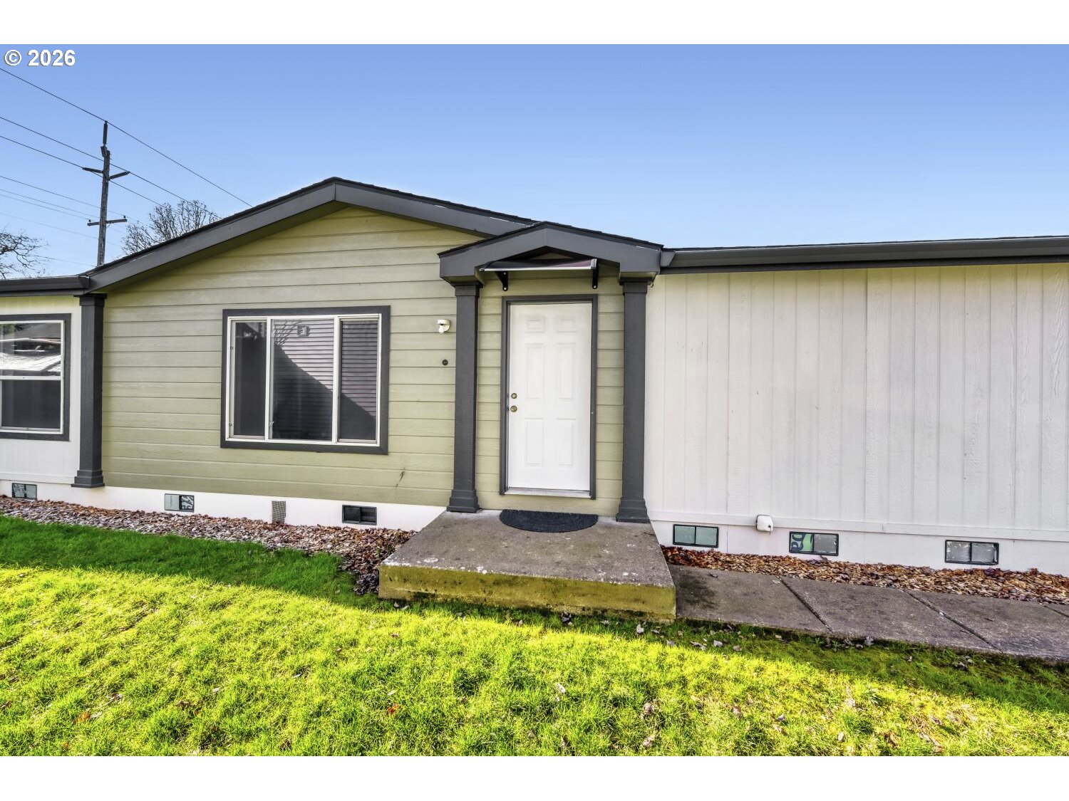 2431 North Fremont Street Cornelius, OR 97113 - Photo 3 of 29 a front view of a house with a yard