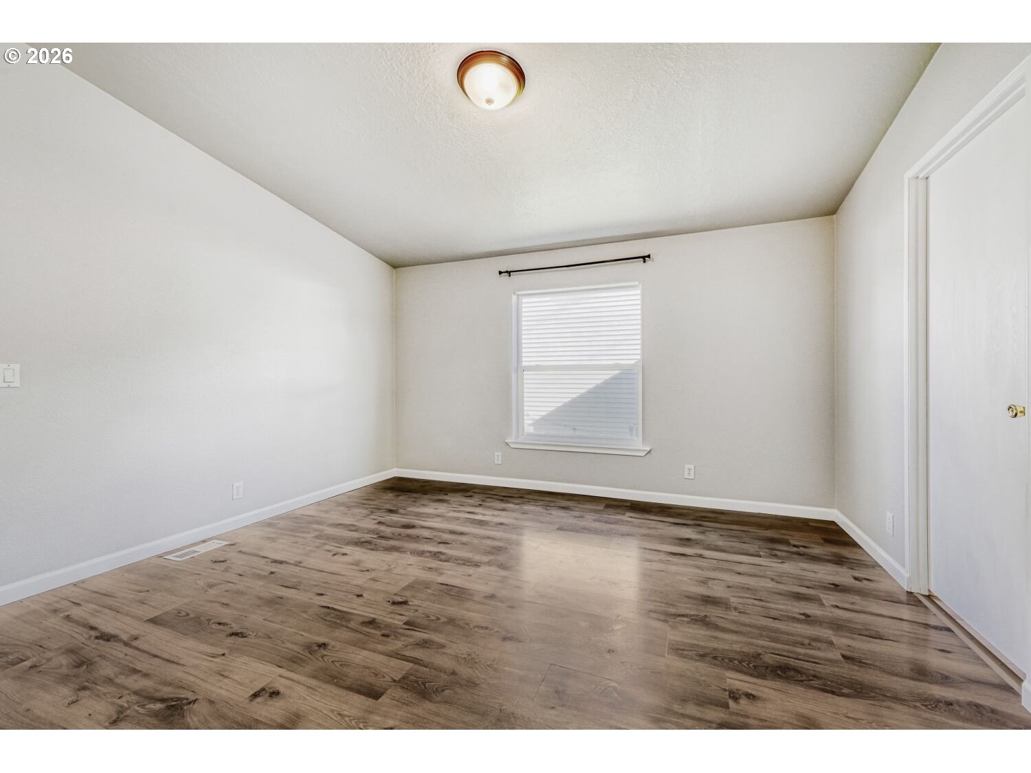 2431 North Fremont Street Cornelius, OR 97113 - Photo 9 of 29 a view of an empty room and window