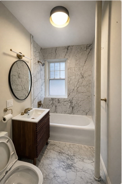 4 Chiswick Road, Unit 34 Boston, MA 02135 - Photo 7 of 10 a bathroom with a tub sink and mirror