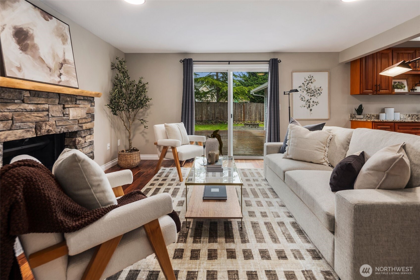 22707 14th Place West Bothell, WA 98021 - Photo 16 of 39 a living room with furniture and a fireplace