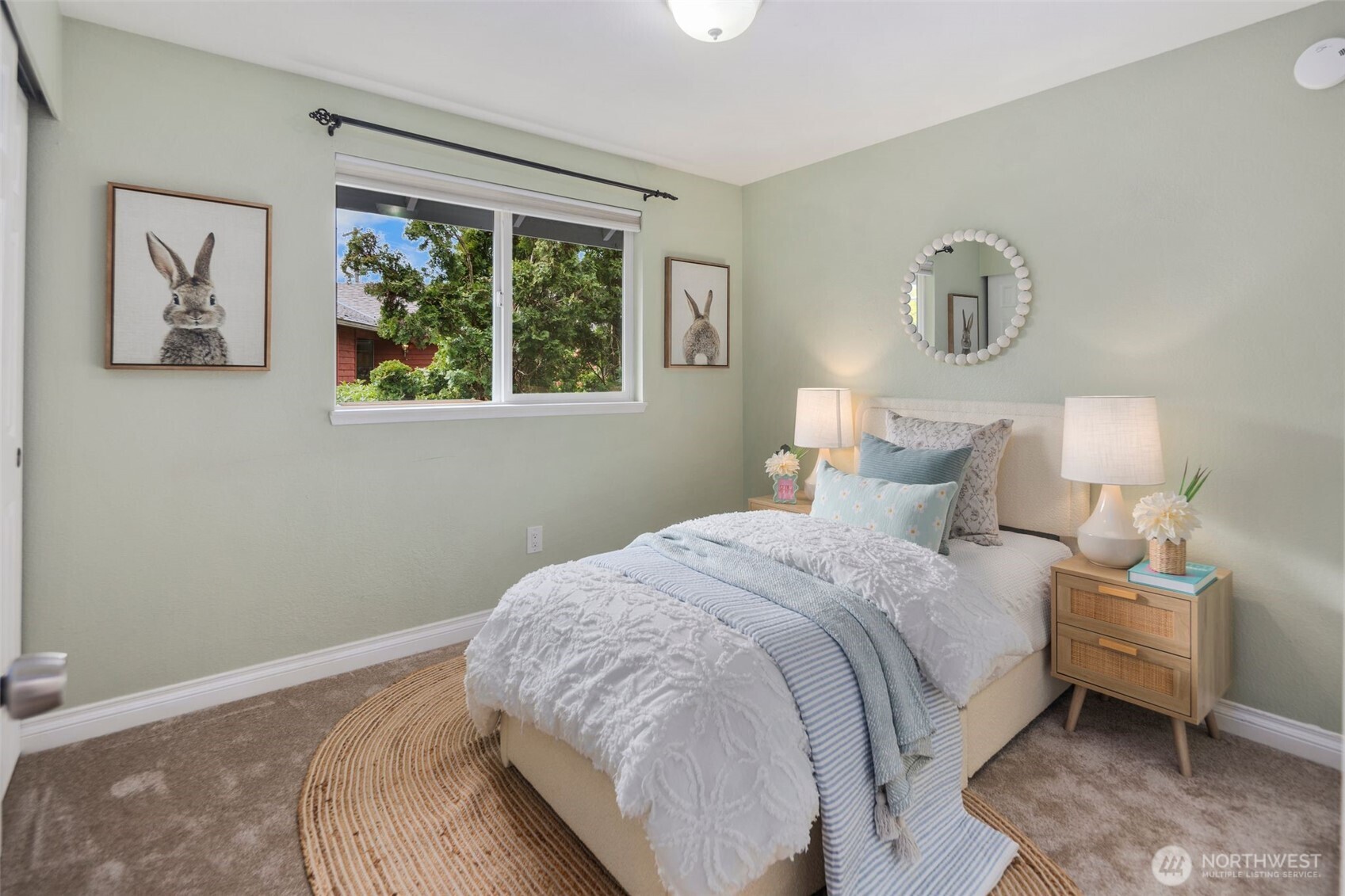 22707 14th Place West Bothell, WA 98021 - Photo 21 of 39 a bedroom with a bed and a window