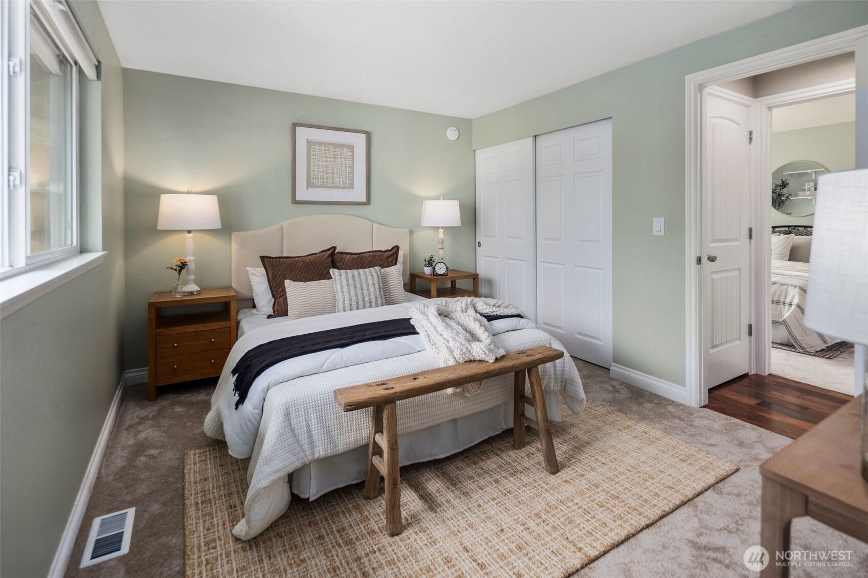 22707 14th Place West Bothell, WA 98021 - Photo 23 of 39 a bedroom with a bed and wooden floor