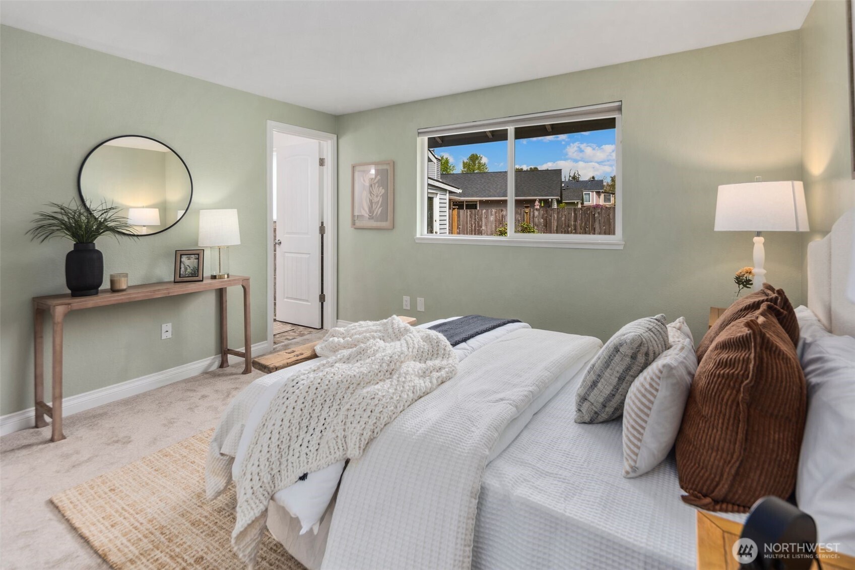 22707 14th Place West Bothell, WA 98021 - Photo 24 of 39 a bedroom with a bed and a mirror