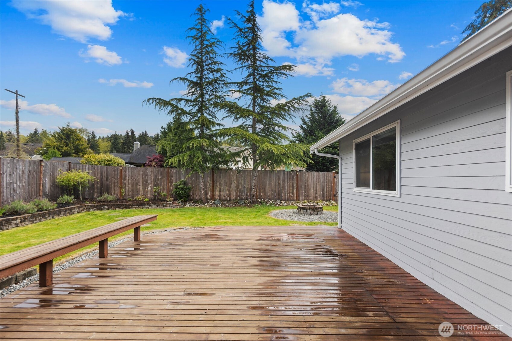 22707 14th Place West Bothell, WA 98021 - Photo 29 of 39 a view of a backyard and basketball court